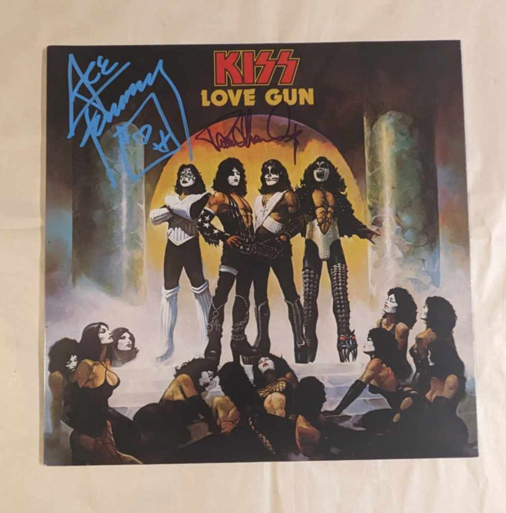 KISSONLINE KISS PAUL STANLEY and ACE FREHLEY signed LOVE GUN LP KOL EX colored vinyl KISS