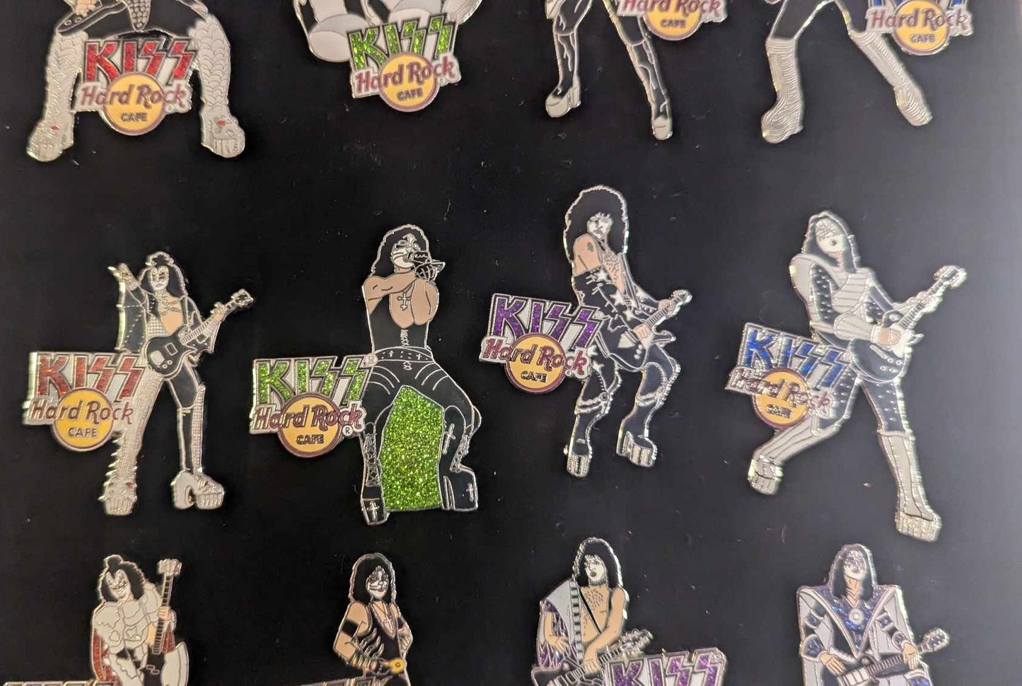 Lot of 12 KISS HARD ROCK CAFE Pins with Display Case